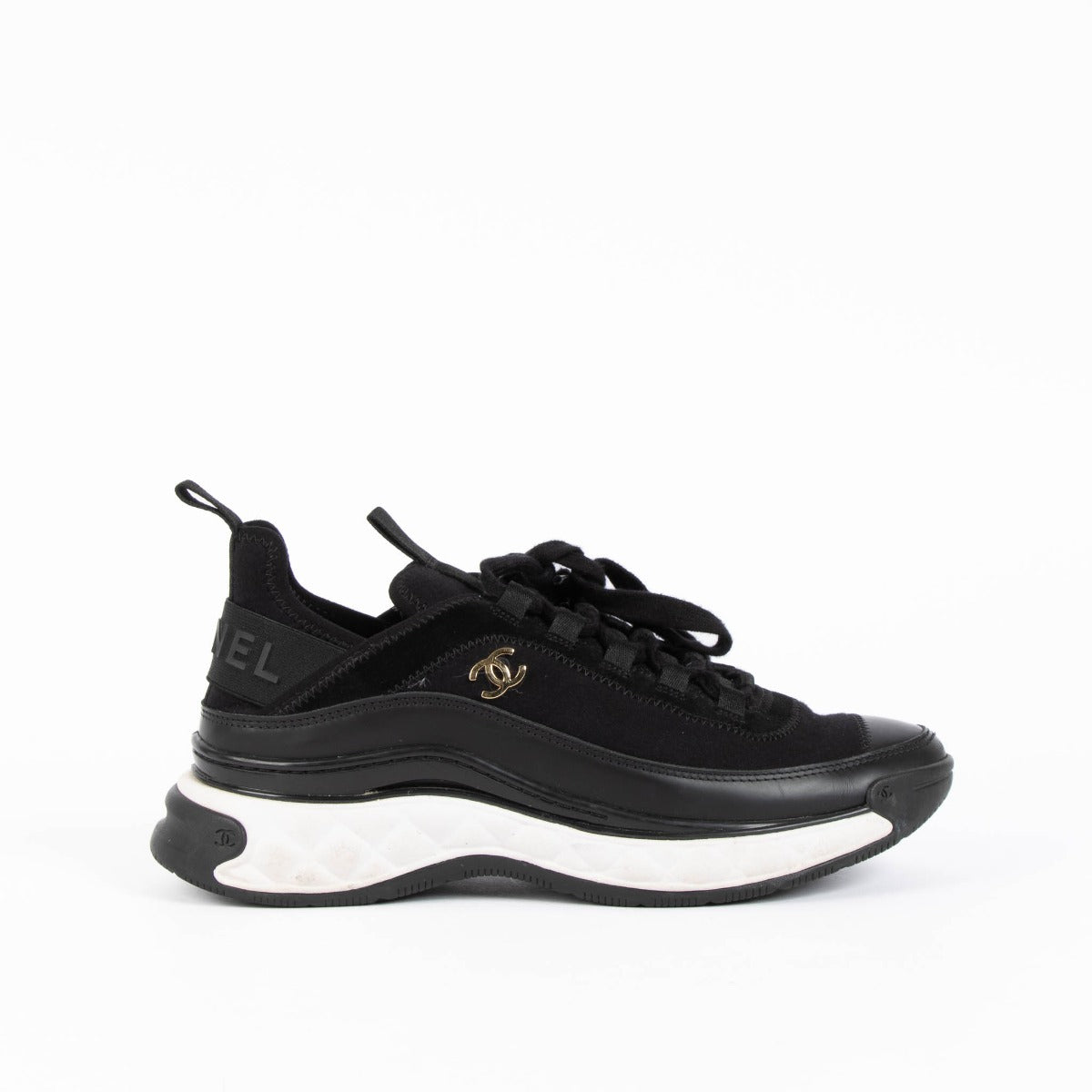Shop this 100% authentic Chanel Black Leather/Velvet Sneakers at Labellov.com