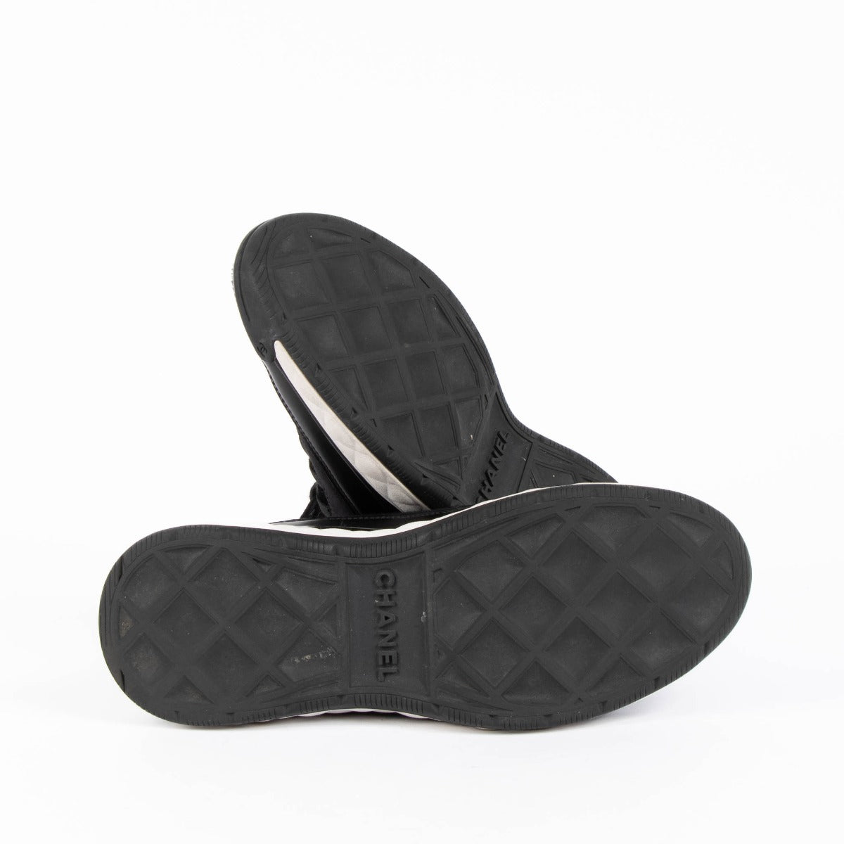 Shop this 100% authentic Chanel Black Leather/Velvet Sneakers at Labellov.com