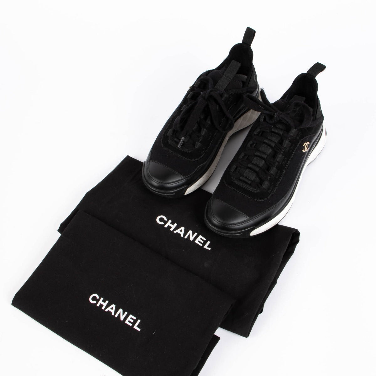 Shop this 100% authentic Chanel Black Leather/Velvet Sneakers at Labellov.com