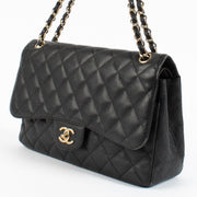 Shop safe online at Labellov in Antwerp and Knokke this 100% authentic second hand Chanel Black Caviar Large Classic Flap Bag