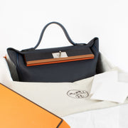 Authentic second hand Hermès 24/24 35 Patchwork on www.labellov.com Hermès 24/24 35 Patchwork Bleu Nuit/Navy/Marine/Gold/Terre Battue Togo/Swift/Alligator Palladium Hardware