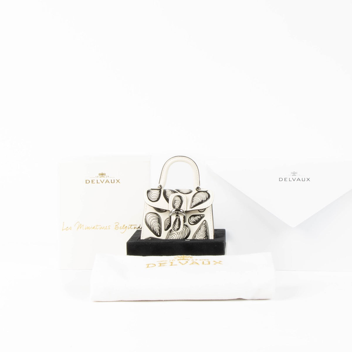 Authentic pre-loved Delvaux Oostende Miniature Brillant Charm on Labellov.com