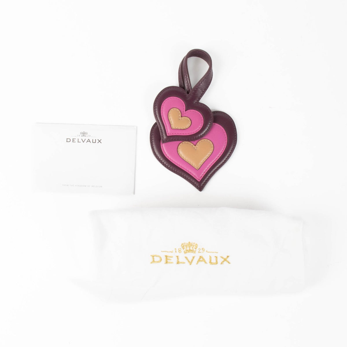 Authentic pre-loved Delvaux Purple Leather Heart Charm on Labellov.com