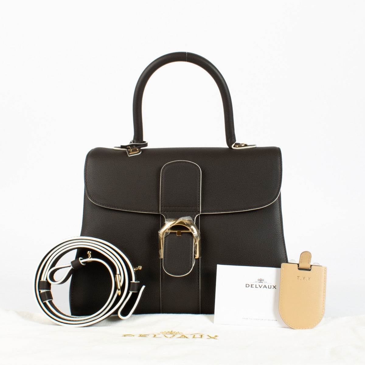 Authentic Delvaux Brillant MM in Ebène Box Calf leather a timeless luxury handbag in excellent condition at Labellov.com.