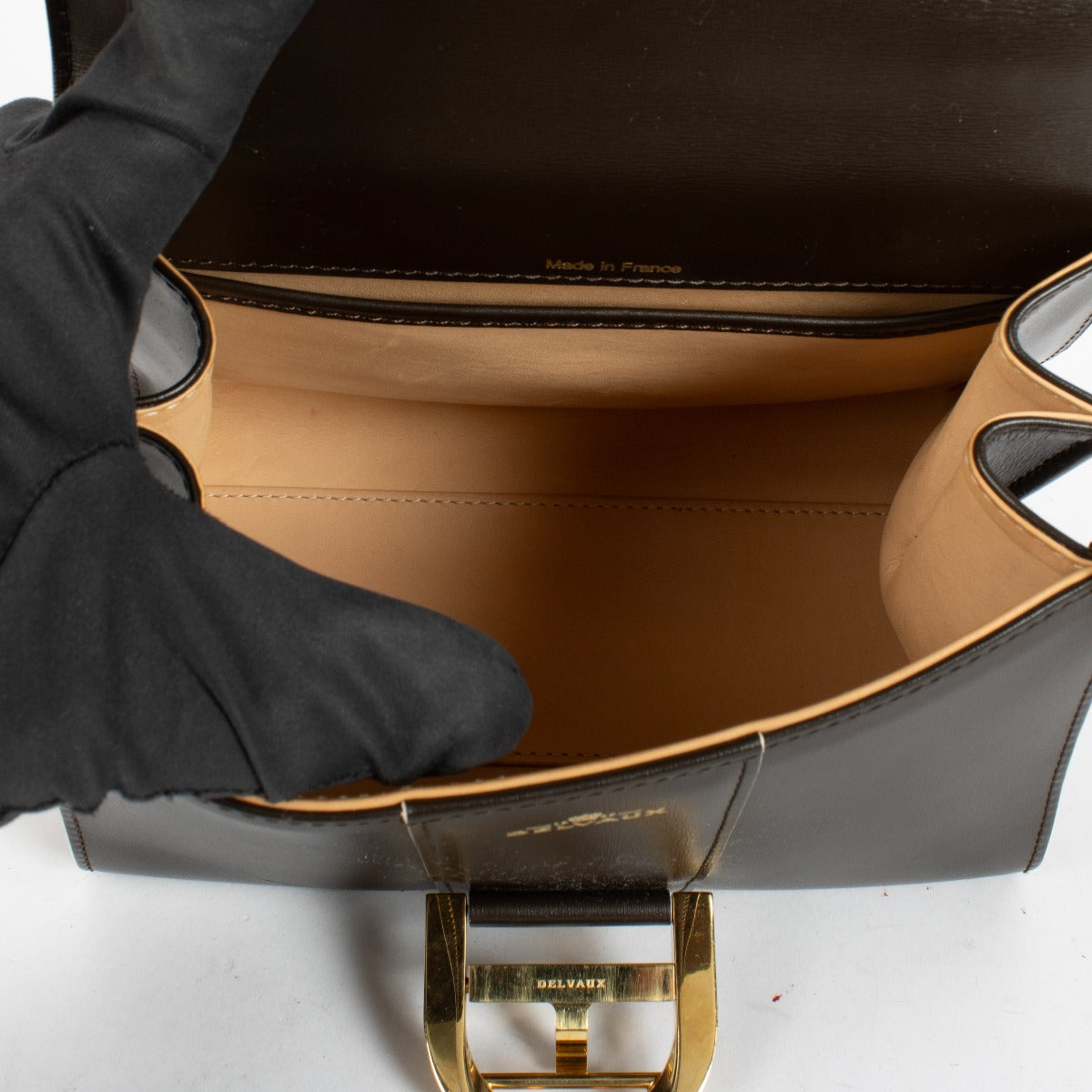 Authentic pre-loved Delvaux Ebène Box Calf Brillant Mini Bag on Labellov.com