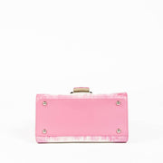 Shop this 100% authentic Delvaux Flamingo Cuir Oeillet Brillant Mini Bag at Labellov.com