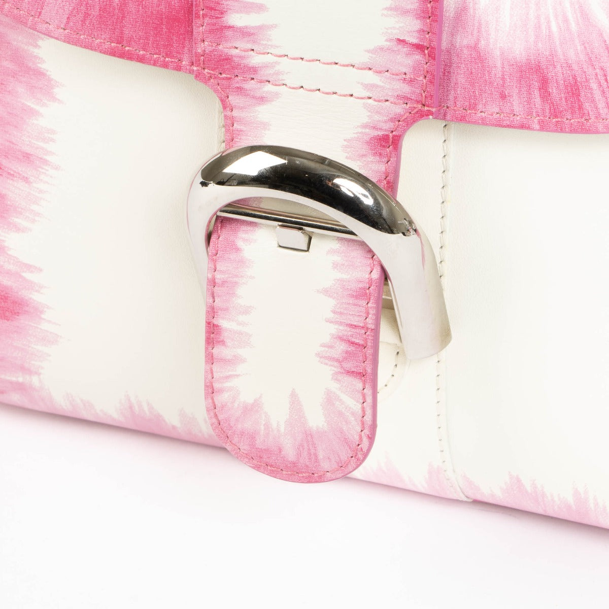 Shop this 100% authentic Delvaux Flamingo Cuir Oeillet Brillant Mini Bag at Labellov.com