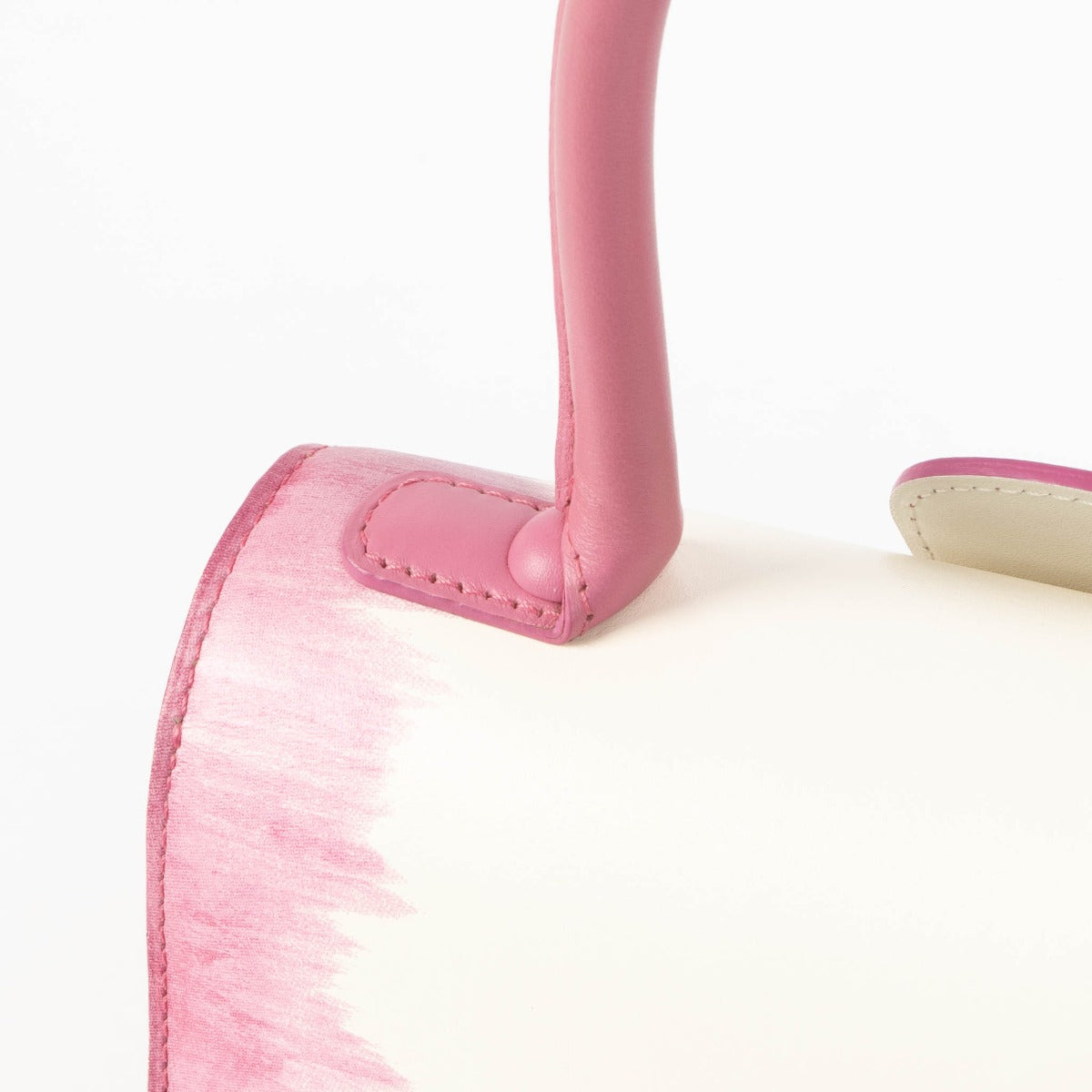 Shop this 100% authentic Delvaux Flamingo Cuir Oeillet Brillant Mini Bag at Labellov.com