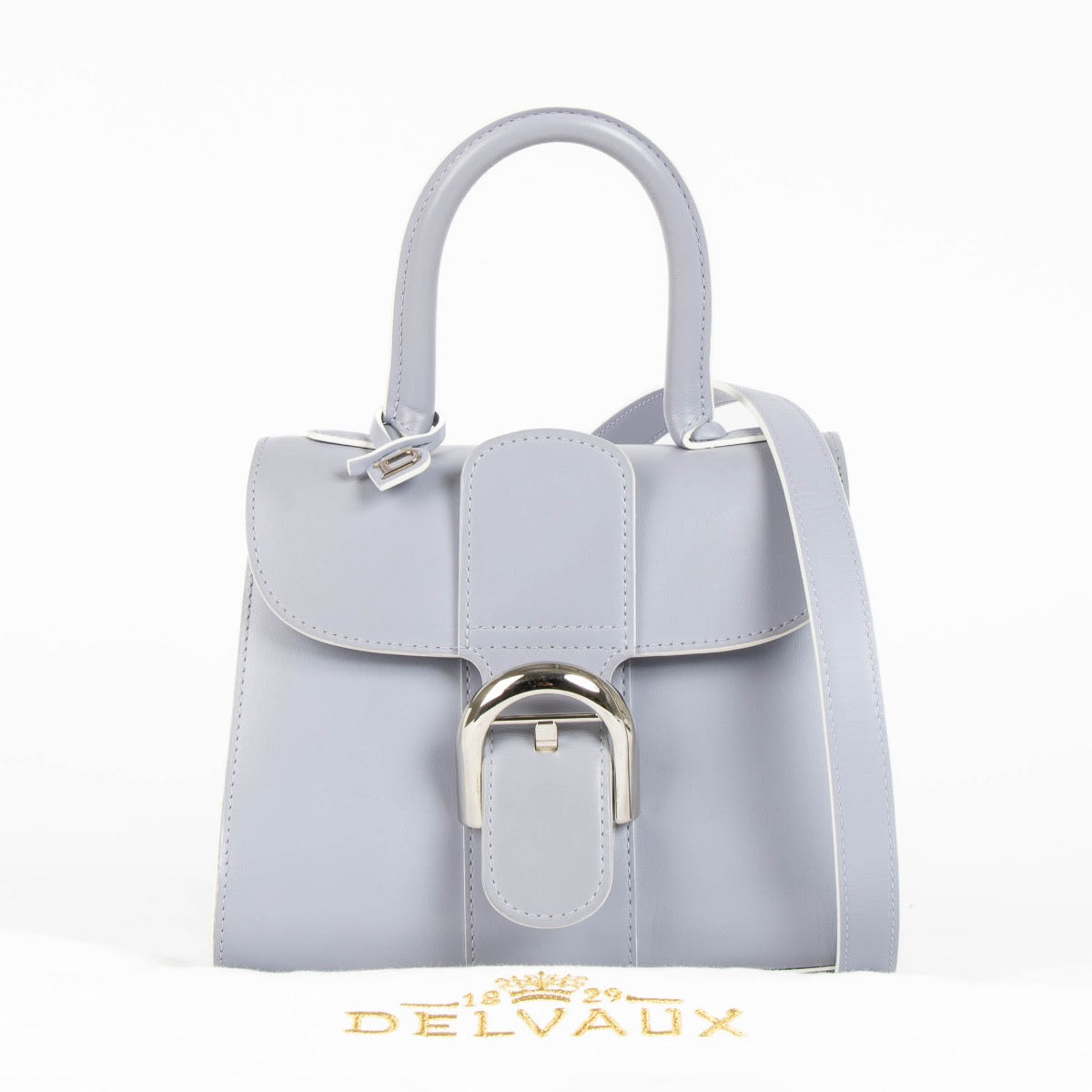 Authentic pre-loved Delvaux Lilas Box Calf Mini Brillant Bag on Labellov.com