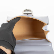 Authentic pre-loved Delvaux Lilas Box Calf Mini Brillant Bag on Labellov.com