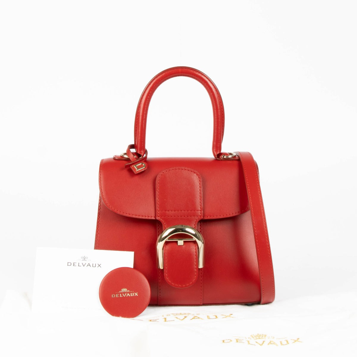 Shop this 100% authentic Delvaux Lipstick Box Calf Brillant Mini Bag at Labellov.com.