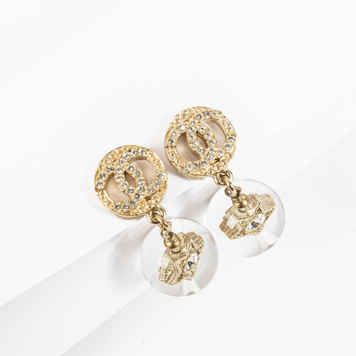 Chanel 19K Gold Crystal Star CC Pendant Earrings
