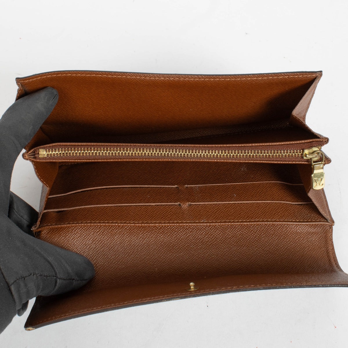 Authentic pre-loved Louis Vuitton Monogram Canvas Sarah Long Wallet on Labellov.com