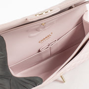 Authentic Second Hand Chanel Pale Pink Caviar Medium Classic 11.12 Bag in brand new condition with stickers on Labellov.com