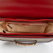 Shop safe online at Labellov in Antwerp, Brussels and Knokke this 100% authentic second hand Gucci Red GG Supreme Horsebit 1955 Medium