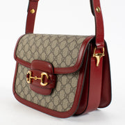 Shop safe online at Labellov in Antwerp, Brussels and Knokke this 100% authentic second hand Gucci Red GG Supreme Horsebit 1955 Medium