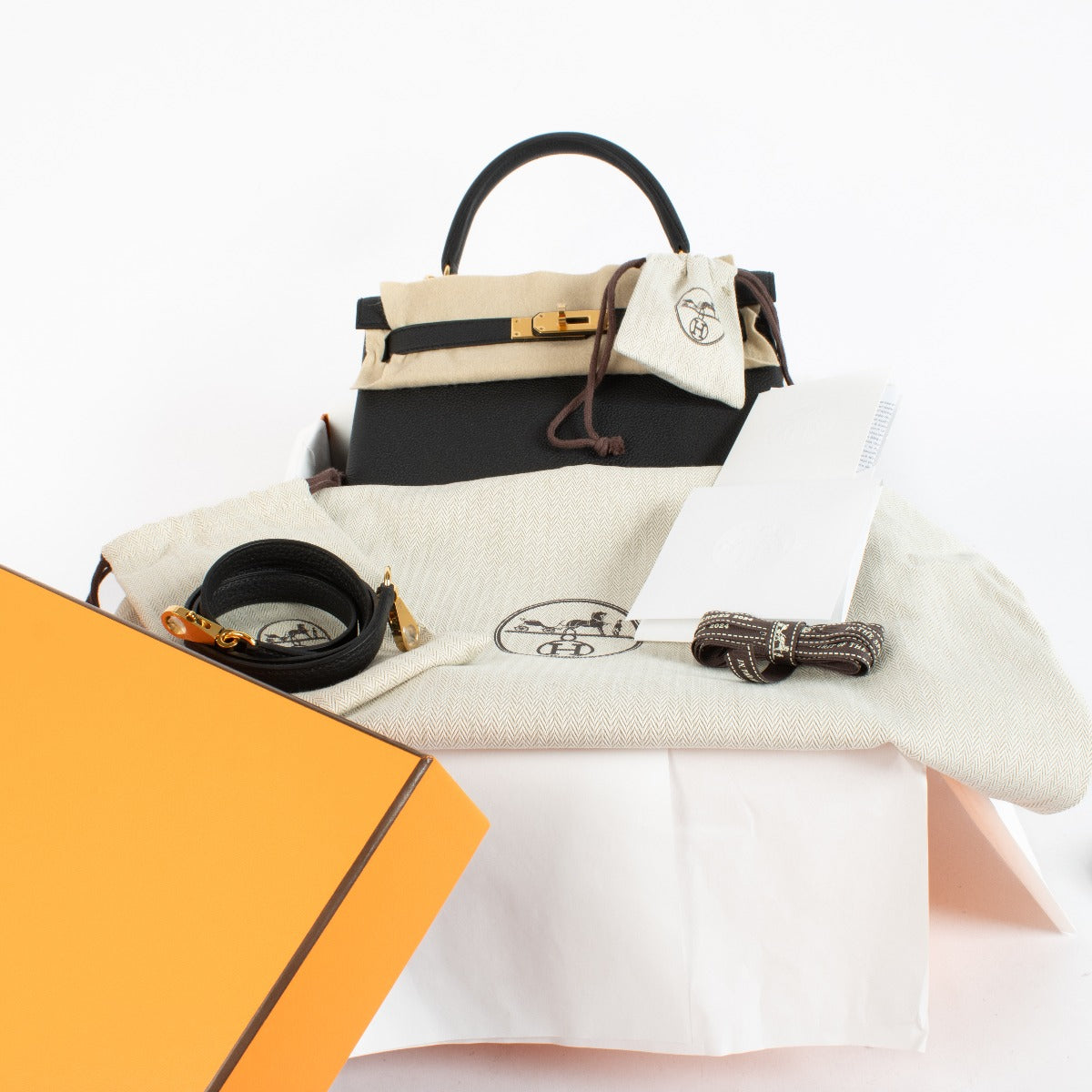 Hermès Kelly 28 Zwart Togo GHW