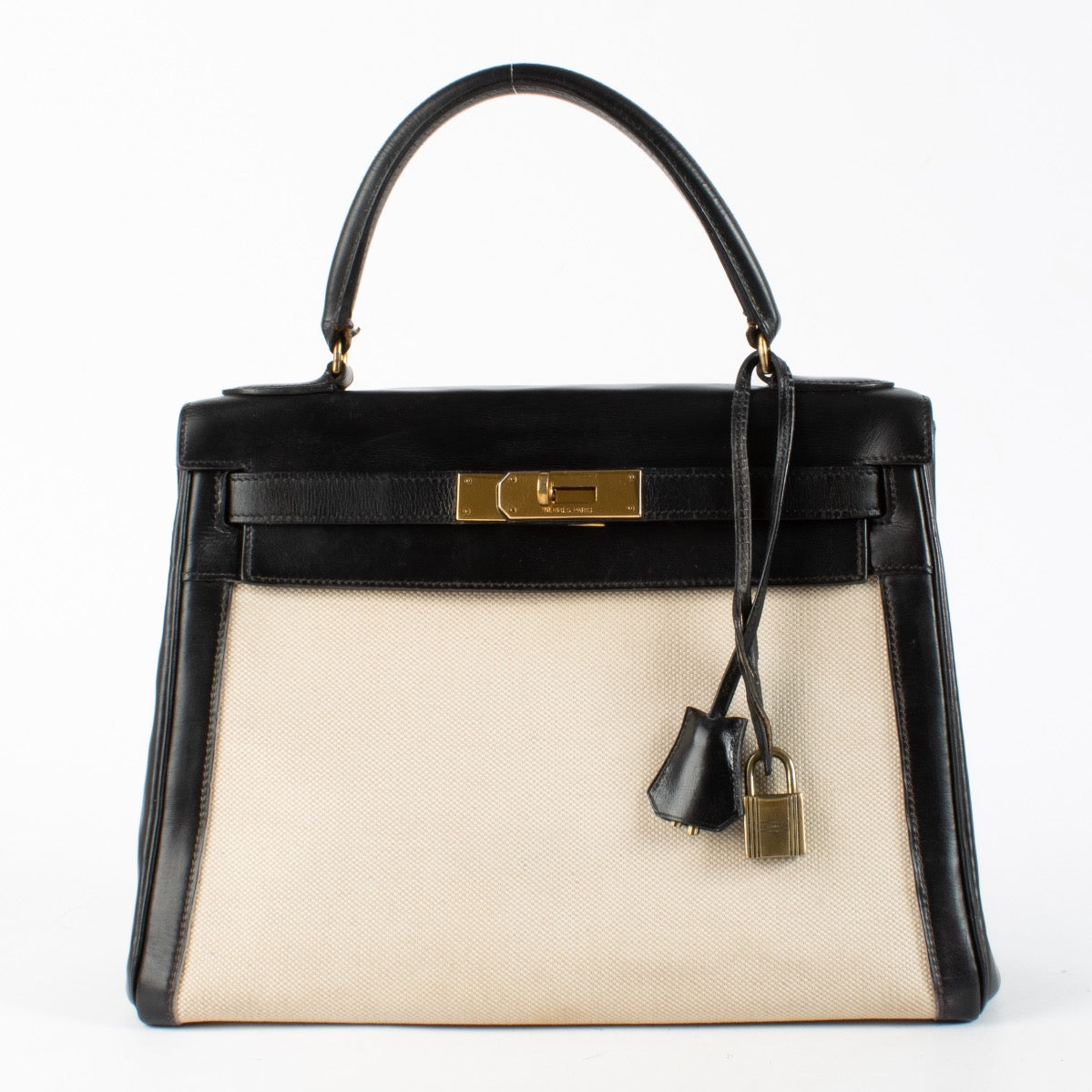 shop 100% authentic second hand Hermès Vintage Kelly 28 Toile H Canvas/Box GHW on Labellov.com