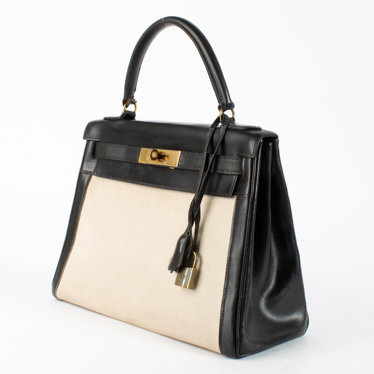shop 100% authentic second hand Hermès Vintage Kelly 28 Toile H Canvas/Box GHW on Labellov.com