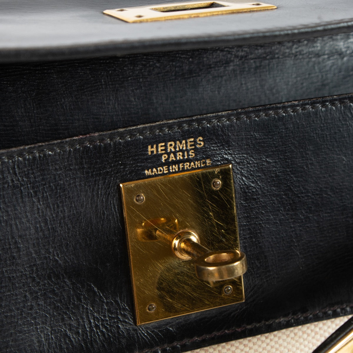 shop 100% authentic second hand Hermès Vintage Kelly 28 Toile H Canvas/Box GHW on Labellov.com