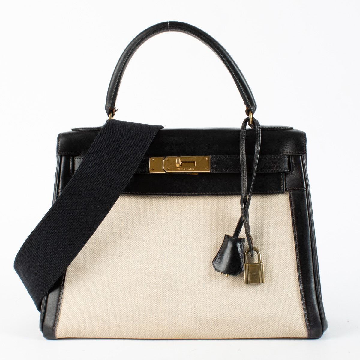 shop 100% authentic second hand Hermès Vintage Kelly 28 Toile H Canvas/Box GHW on Labellov.com