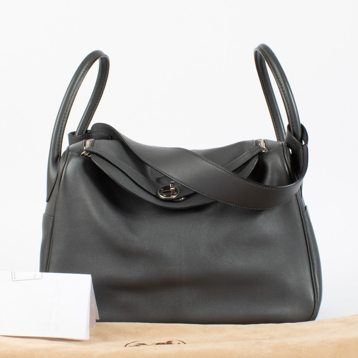 Authentic pre-loved Hermès Lindy 34 in Ardoise Swift leather with palladium hardware, available at Labellov.com.