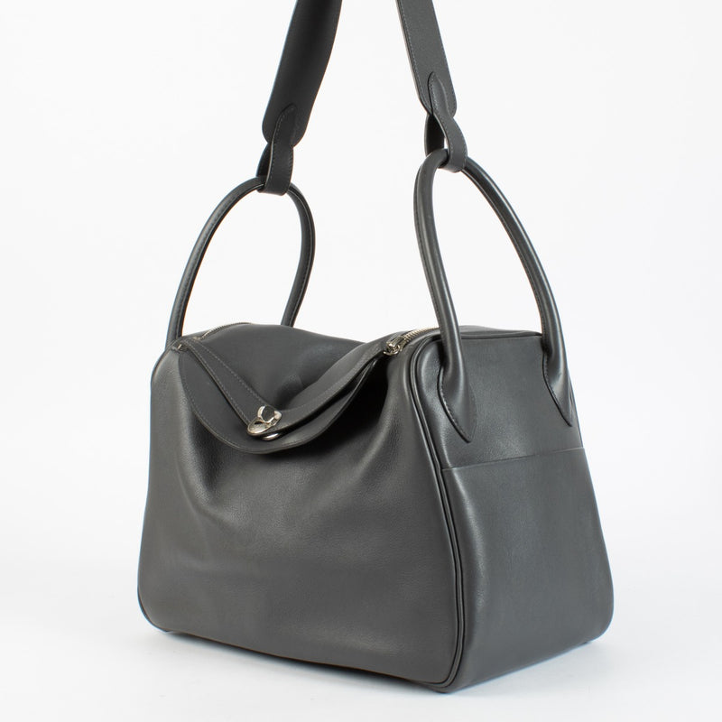 Authentic pre-loved Hermès Lindy 34 in Ardoise Swift leather with palladium hardware, available at Labellov.com.