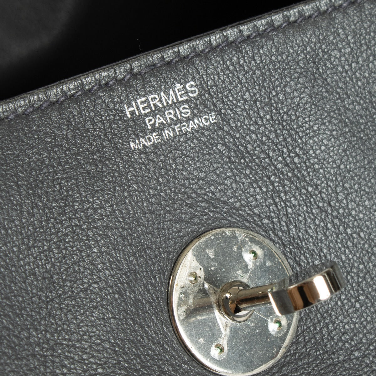 Authentic pre-loved Hermès Lindy 34 in Ardoise Swift leather with palladium hardware, available at Labellov.com.