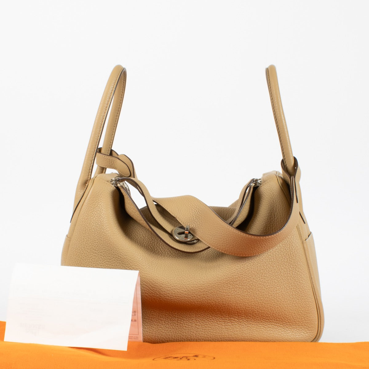 Authentic secondhand Hermès Lindy 34 in Biscuit Taurillon Clemence leather with palladium hardware at Labellov.com.