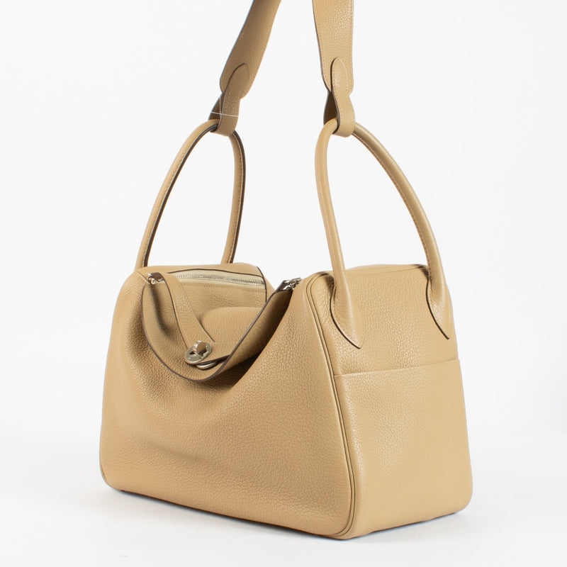 Authentic secondhand Hermès Lindy 34 in Biscuit Taurillon Clemence leather with palladium hardware at Labellov.com.