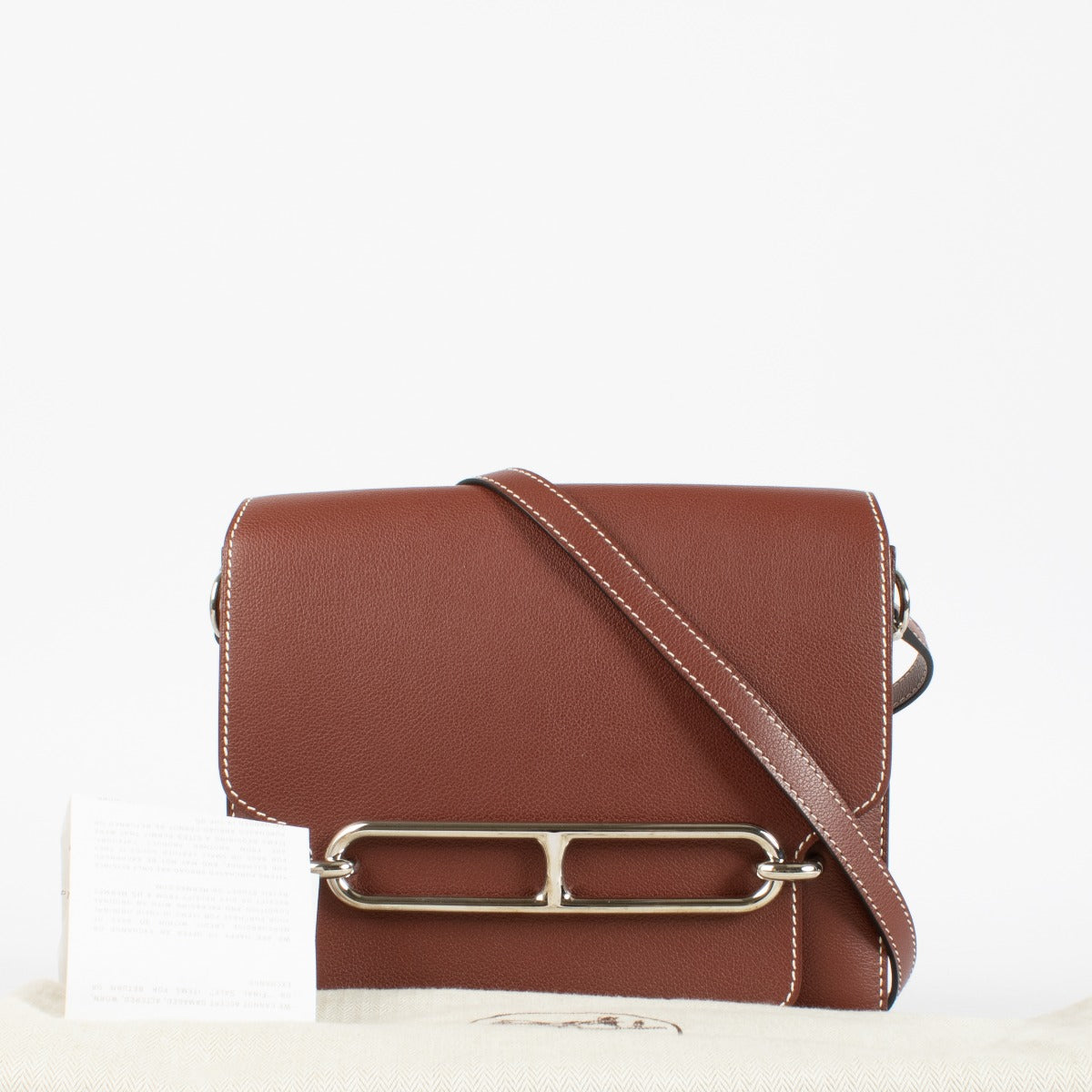 Authentic luxury in excellent condition: Hermès Sac Roulis 23 Rouge H Evercolor with palladium hardware at Labellov.com.