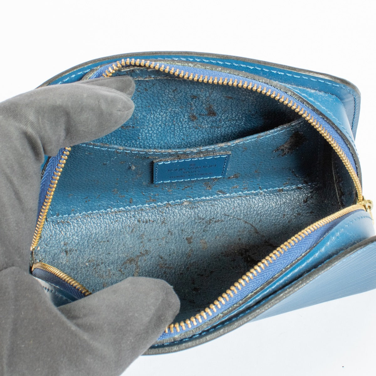 Pochette Louis Vuitton Dauphine PM en cuir Épi bleu Tolède