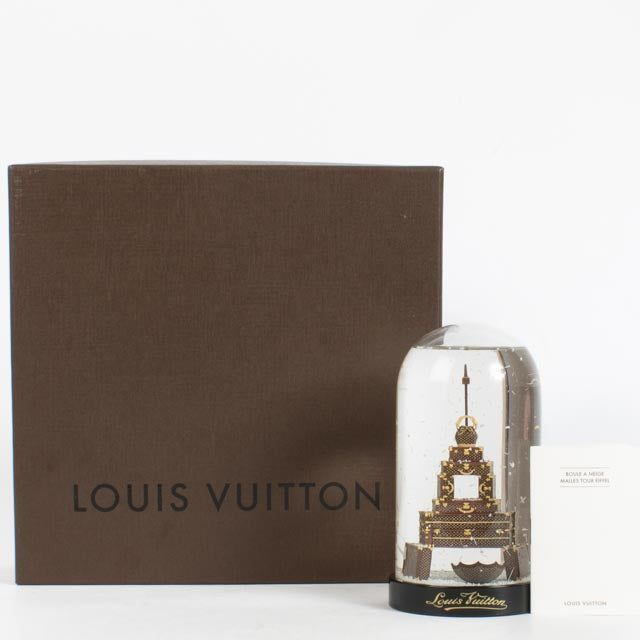 Shop the authentic Louis Vuitton Eiffel Tower Snow Globe second hand on Labellov.com.