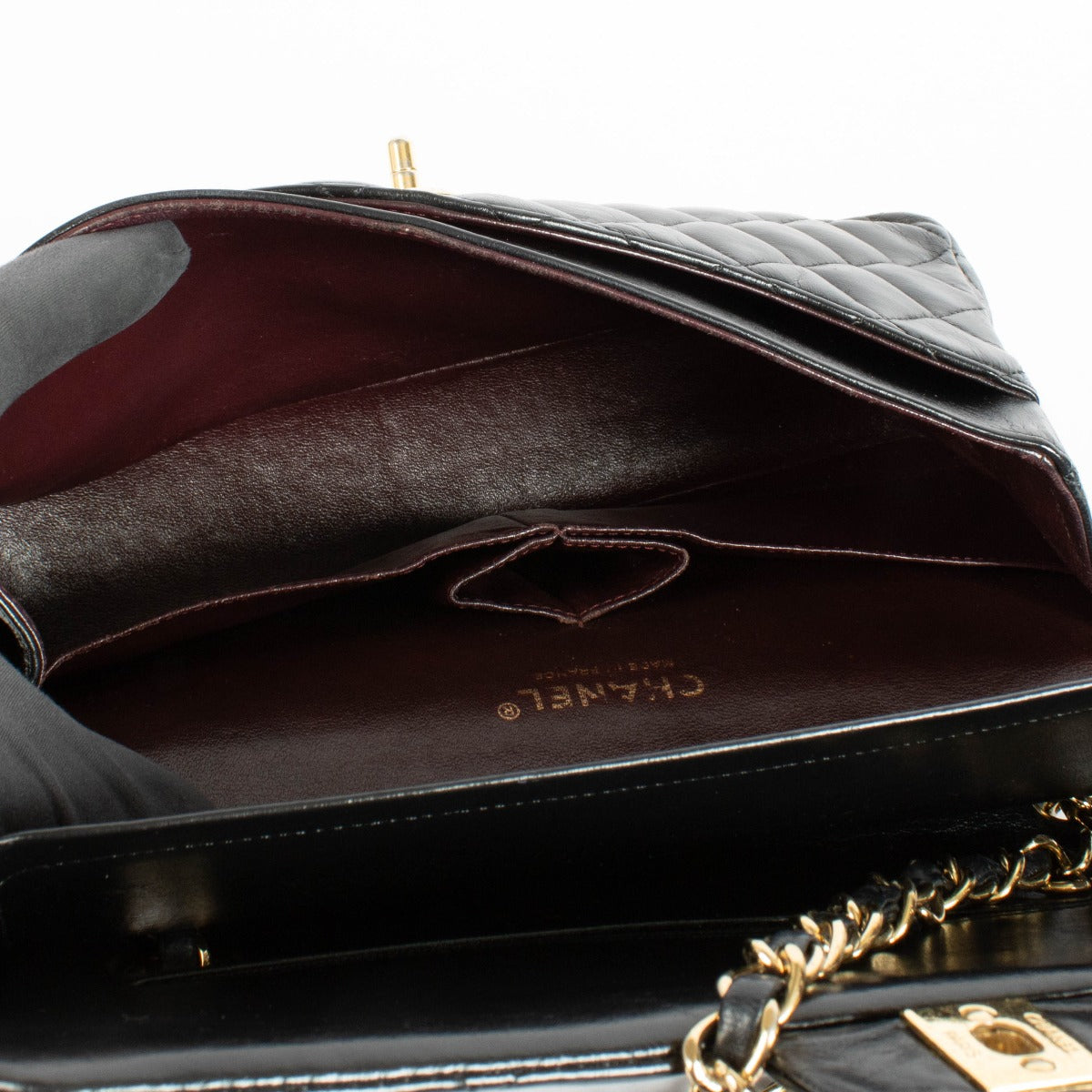 Shop the authentic Chanel Black Lambskin Medium Classic 11.12 Handbag on Labellov.com.