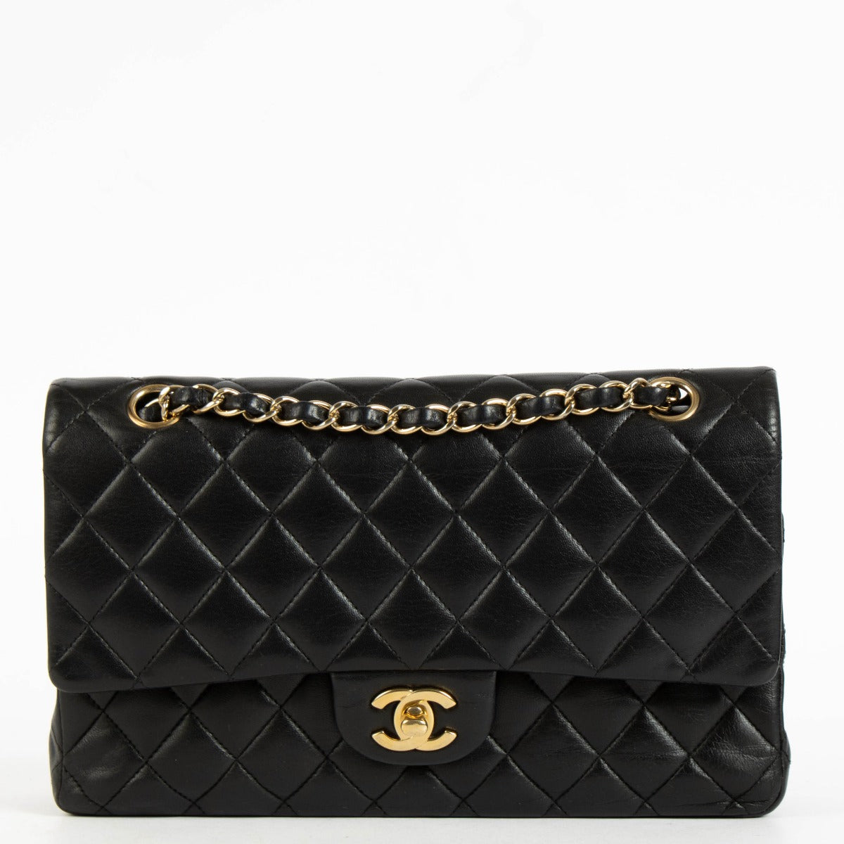 Shop the authentic Chanel Black Lambskin Medium Classic 11.12 Handbag on Labellov.com.