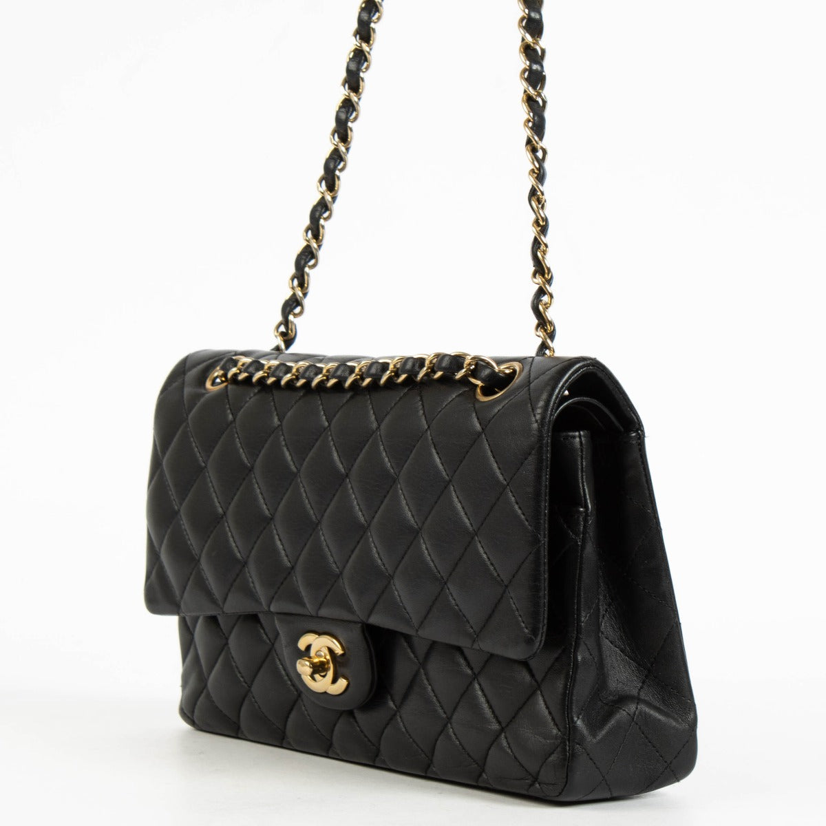 Shop the authentic Chanel Black Lambskin Medium Classic 11.12 Handbag on Labellov.com.