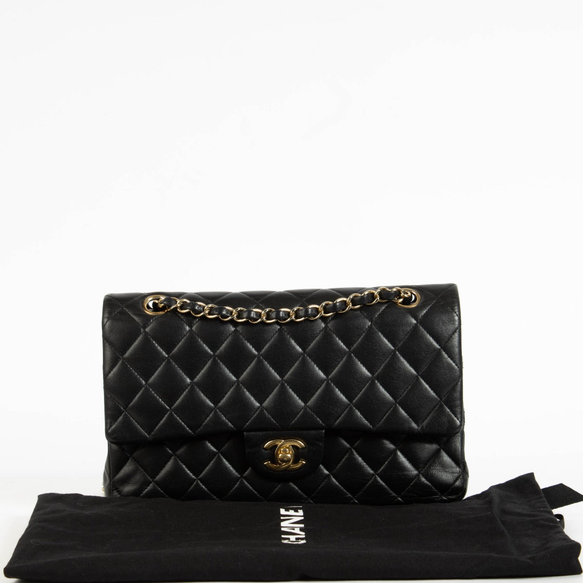 Shop the authentic Chanel Black Lambskin Medium Classic 11.12 Handbag on Labellov.com.