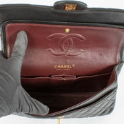shop 100% authentic second hand Chanel Black Lambskin Medium Classic 11.12 Bag on Labellov.com