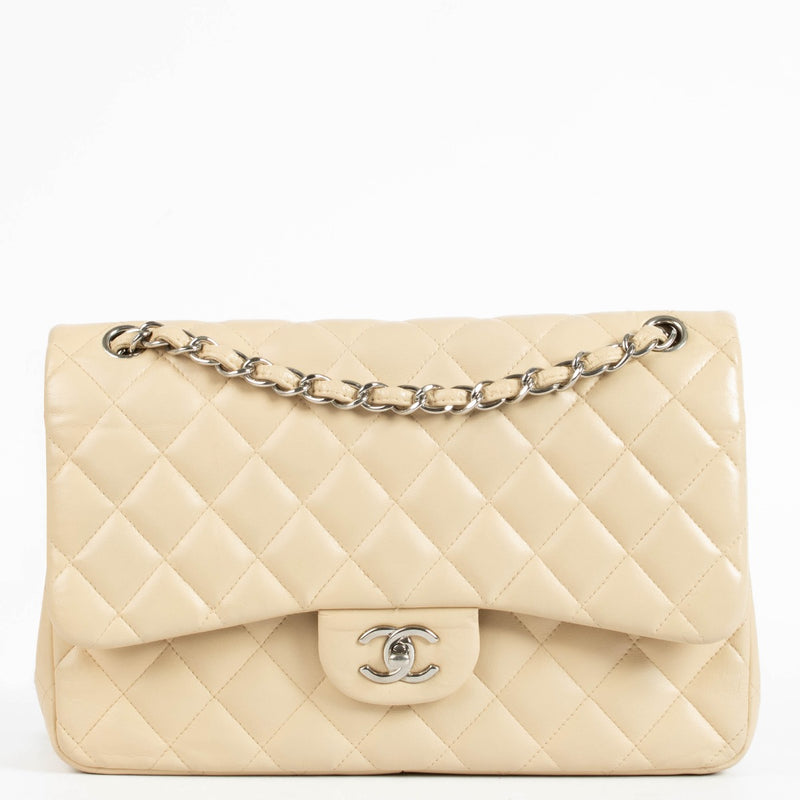 Shop the authentic Chanel Beige Lambskin Large / Jumbo Classic Flap Bag second hand on Labellov.com.