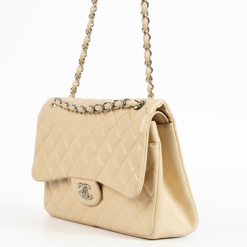 Shop the authentic Chanel Beige Lambskin Large / Jumbo Classic Flap Bag second hand on Labellov.com.