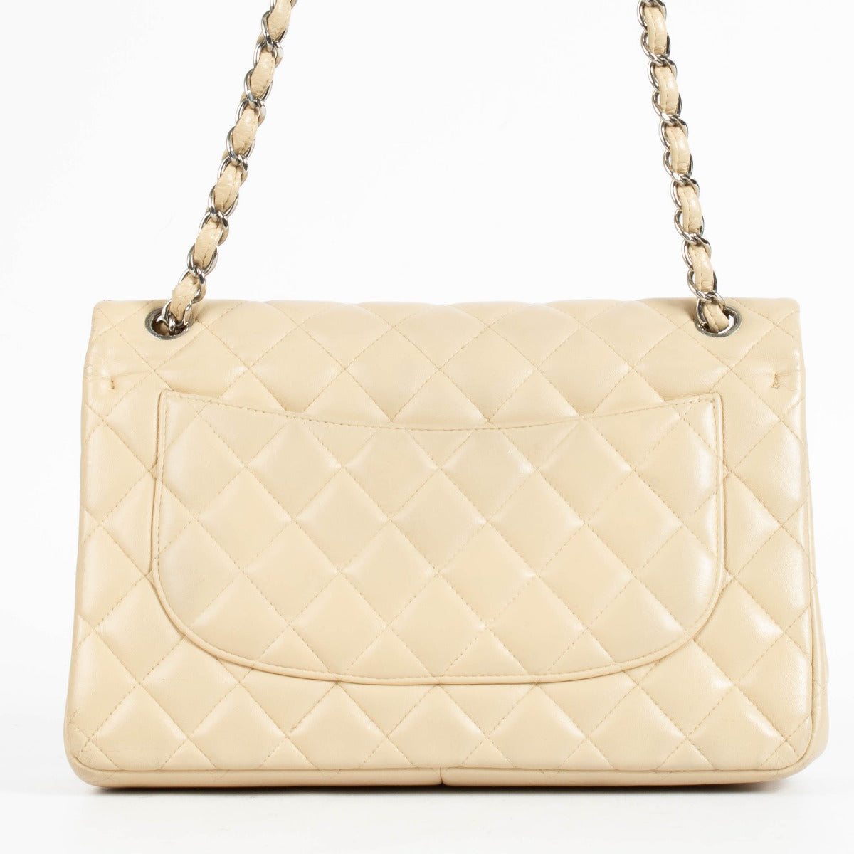 Shop the authentic Chanel Beige Lambskin Large / Jumbo Classic Flap Bag second hand on Labellov.com.