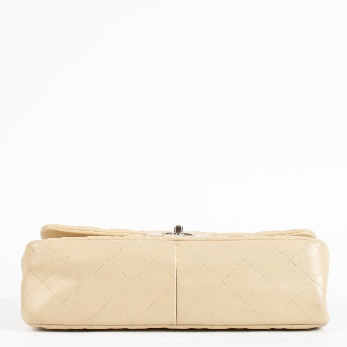 Shop the authentic Chanel Beige Lambskin Large / Jumbo Classic Flap Bag second hand on Labellov.com.