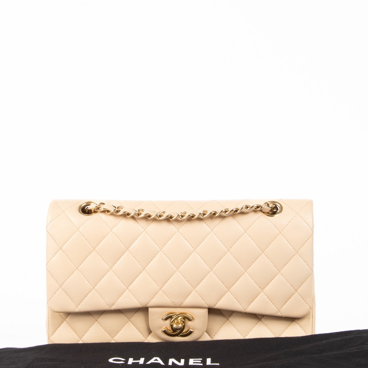 Shop safe online at Labellov in Antwerp, Brussels and Knokke this 100% authentic second hand, preloved Chanel Beige Lambskin Medium Classic Flap 11.12