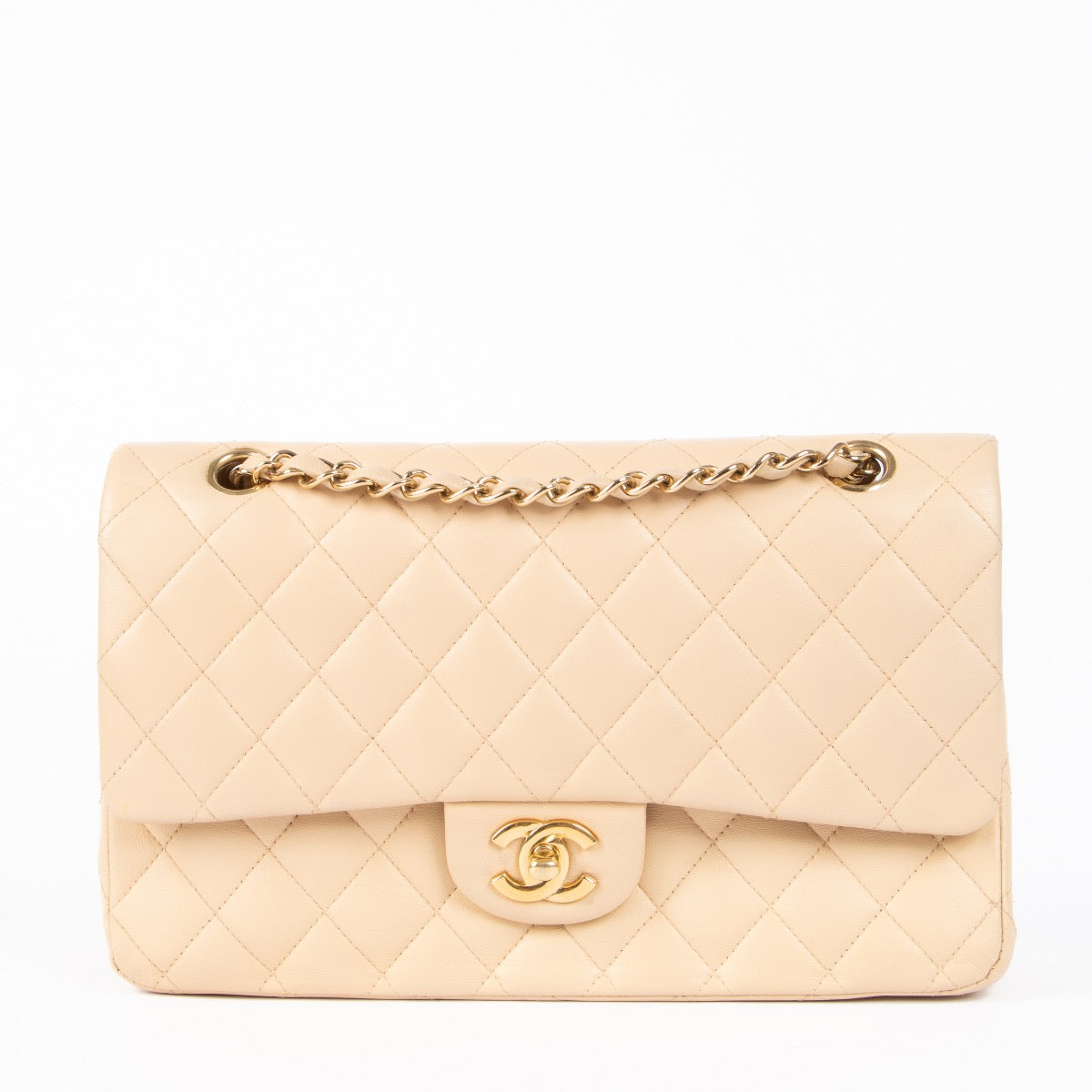 Shop safe online at Labellov in Antwerp, Brussels and Knokke this 100% authentic second hand, preloved Chanel Beige Lambskin Medium Classic Flap 11.12