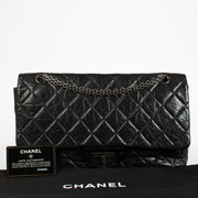 Authentic pre-loved Chanel Black Aged Calfskin Maxi 2.55 Bag on Labellov.com