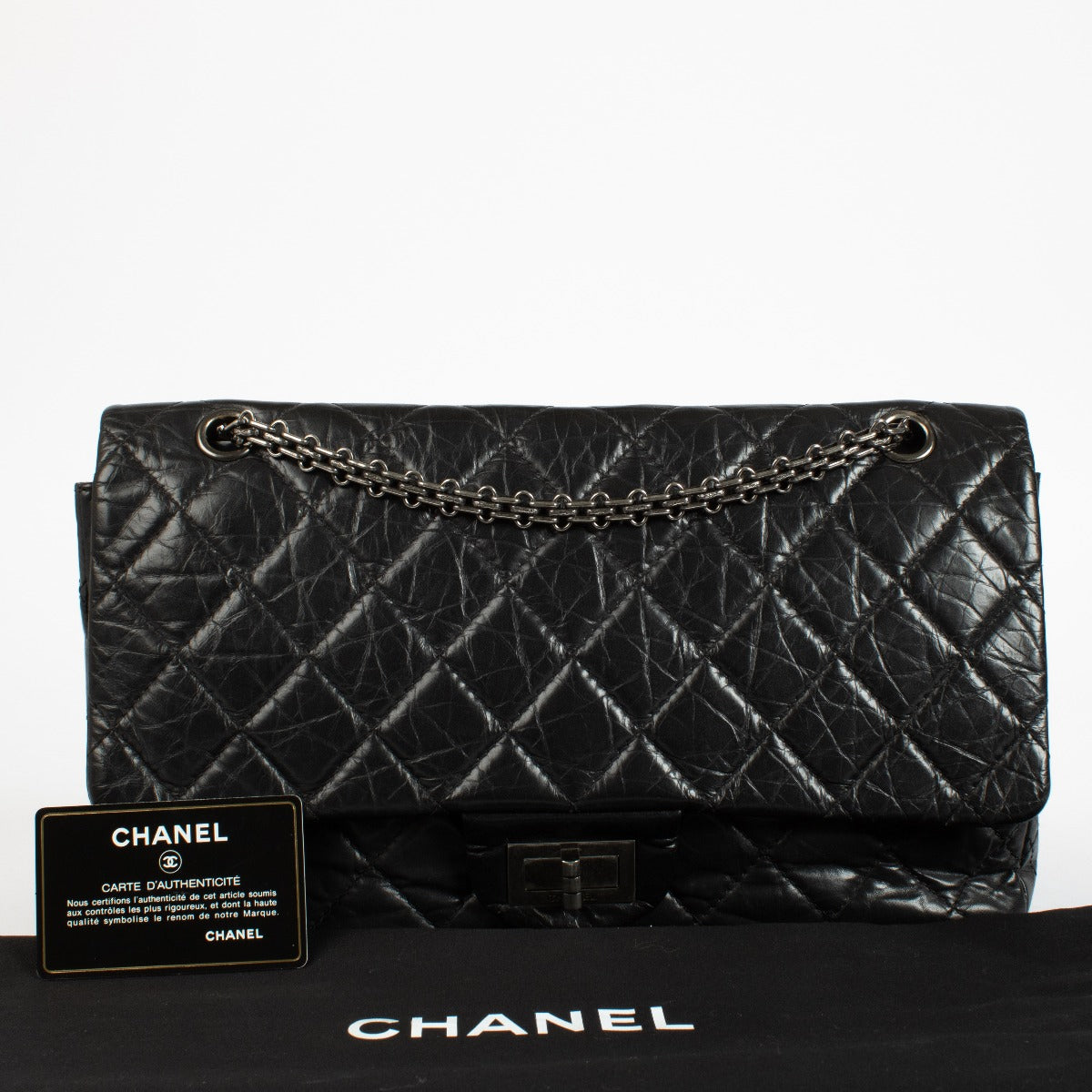 Authentic pre-loved Chanel Black Aged Calfskin Maxi 2.55 Bag on Labellov.com