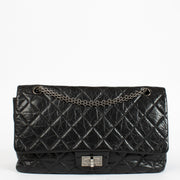 Authentic pre-loved Chanel Black Aged Calfskin Maxi 2.55 Bag on Labellov.com