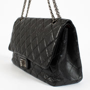 Authentic pre-loved Chanel Black Aged Calfskin Maxi 2.55 Bag on Labellov.com