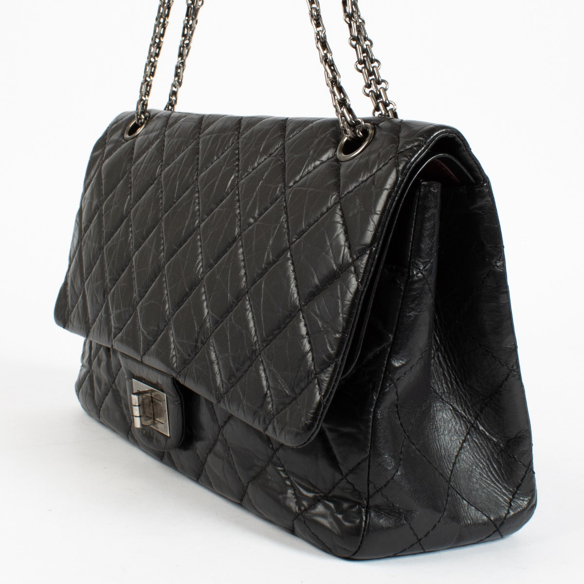 Authentic pre-loved Chanel Black Aged Calfskin Maxi 2.55 Bag on Labellov.com