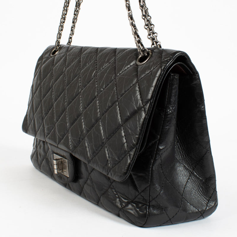 Authentic pre-loved Chanel Black Aged Calfskin Maxi 2.55 Bag on Labellov.com